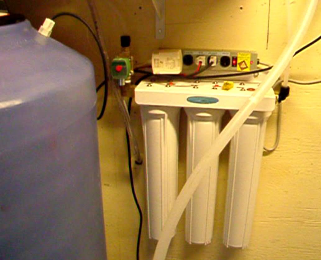 WoLF installation in garage showing 3 stage filter ahead of WoLF